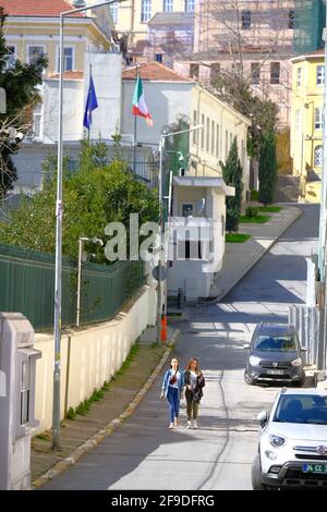 ISTANBU, TURKEY - Mar 07, 2020: Two city young women walking and talking in the street near the Italian embassy. Stock Photo