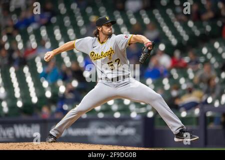 Pittsburgh Pirates relief pitcher Clay Holmes right, talks with