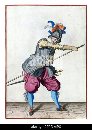 A soldier, full-length, to the right, holding the tip of his spear (lance) forward with his right hand and grasping the shaft with his left hand Stock Photo