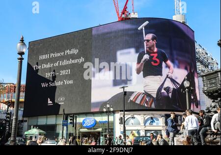 London, UK. 17th Apr, 2021. Prince Philip tributes are seen displayed on the screens at Piccadilly Circus on the day of his funeral. Credit: SOPA Images Limited/Alamy Live News Stock Photo