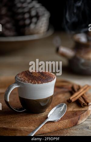 Hot Chocolate, Autumn, winter, warm, cocoa, pine cones and cinnamon stick, natural Stock Photo
