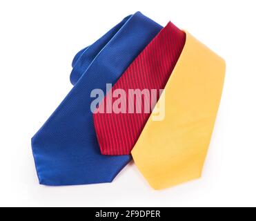 Red silk business tie rolled up over white background. Stock Photo