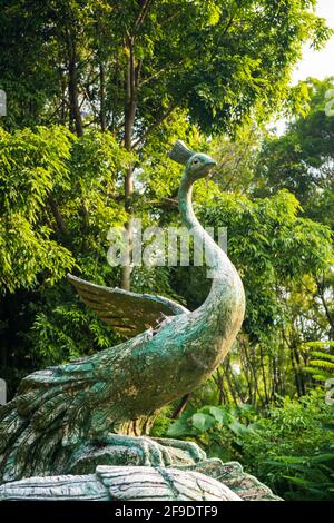 Shenzhen, China. October, 2019. Stone Peacock in the New Hakka Legend. It's a garden in Shenzhen International Garden and Flower Expo Park. The park s Stock Photo