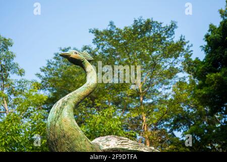 Shenzhen, China. October, 2019. Stone Peacock in the New Hakka Legend. It's a garden in Shenzhen International Garden and Flower Expo Park. The park s Stock Photo