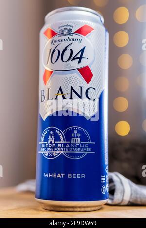 Tyumen, Russia-February 13, 2021: Can of Kronenbourg 1664 Blanc beer. selective focus. Vertical photo Stock Photo