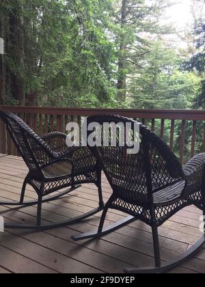 A vertical shot of rocking chairs on the porch at the Carnton Mansion ...
