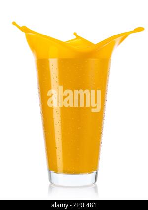 glass of splashing mango juice isolated on white Stock Photo