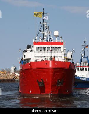 Rostock, Germany. 17th Apr, 2021. The sea rescue ship 'Sea-Eye 4' departs from the fishing port to head for the Mediterranean. The former offshore supply ship, built in 1972, had been prepared for deployment in the Polish port of Swinoujscie and in Rostock over the past few months. The 55-metre-long ship belonging to the Regensburg-based aid organisation Sea-Eye offers plenty of space for the initial treatment of rescued people. Credit: Bernd Wüstneck/dpa-Zentralbild/dpa/Alamy Live News Stock Photo