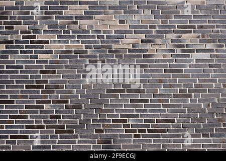 Background from a new gray brick wall Stock Photo