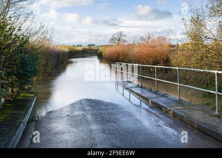 Road blocked by flooding. Flooded rural or country road, Buckinghamshire, UK Stock Photo