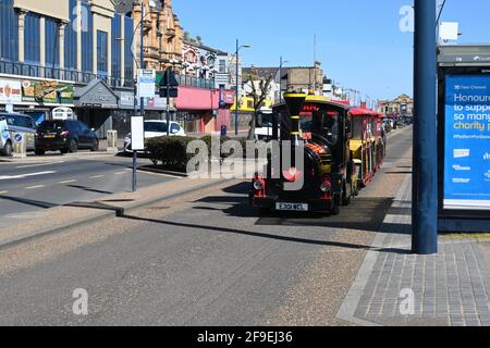 17th April 2021 Great Yarmouth Golden mile road train with people on board Stock Photo