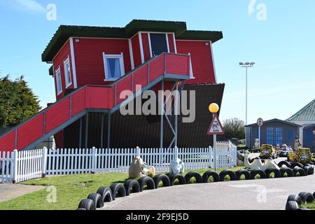 17th April 2021 Great Yarmouth red upside down house on crazy golf course Stock Photo