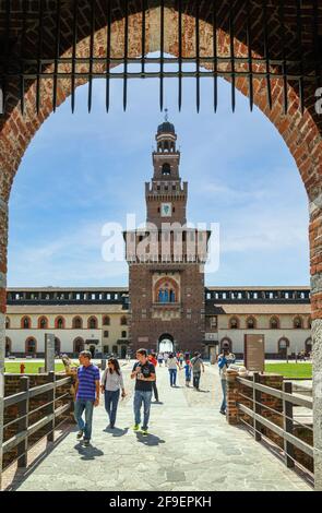 Milan, Milan Province, Lombardy, Italy.  Sforzesco Castle.  Castello Sforzesco.  Torre del Filarete seen across the Piazza d'Armi or Parade Ground. Stock Photo