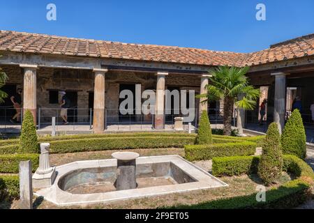 House of the Golden Cupids with garden in peristylium courtyard in ancient city of Pompeii, Campania, Italy Stock Photo