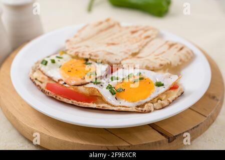 sunny side up eggs with pita bread Stock Photo