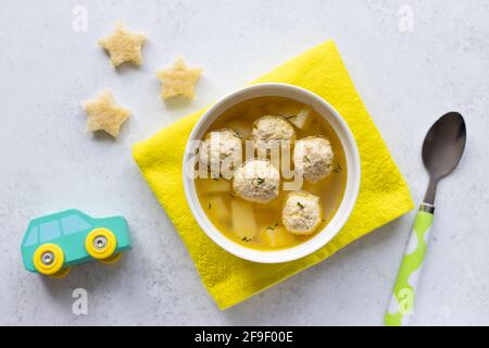 meatballs soup for children with croutons Stock Photo