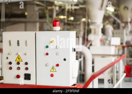The electrical control panel with variety of colorful buttons. Stock Photo
