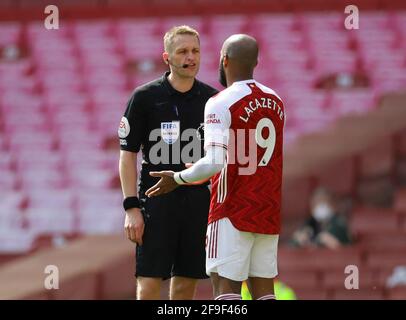 London, UK. 18th Apr, 2021. Referee Craig Pawson talks to Alexandre Lacazette of Arsenal during the Premier League match at the Emirates Stadium, London. Picture credit should read: David Klein/Sportimage Credit: Sportimage/Alamy Live News Stock Photo