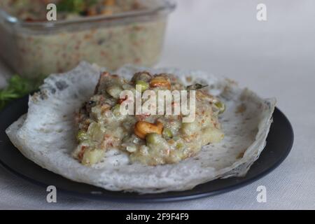 Fermented rice pancakes made with fermented rice batter and coconut milk served along with mixed vegetable ground coconut cashew gravy. Favourite of S Stock Photo