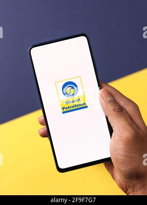 Assam, india - April 19, 2021 : Bharat Petroleum logo on phone screen stock image. Stock Photo