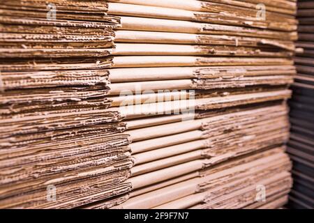 Close-up sides of stacks of cardboard folded Stock Photo