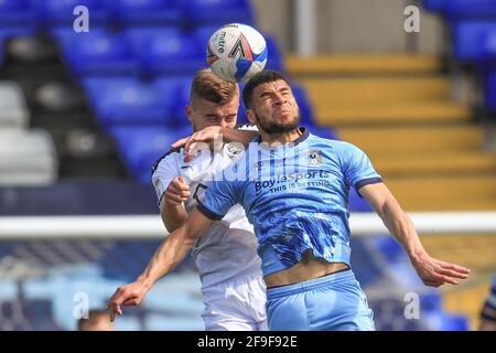 Birmingham, UK. 18th Apr, 2021. Micha? Helik #30 of Barnsley and Maxime Biamou #9 of Coventry City dual for the ball in Birmingham, UK on 4/18/2021. (Photo by Mark Cosgrove/News Images/Sipa USA) Credit: Sipa USA/Alamy Live News Stock Photo