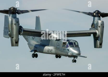 Bell Boeing MV-22B Osprey tilt rotor flying a demonstration at an airshow. US Marine Corps version of V-22 design. Early metallic paint scheme Stock Photo