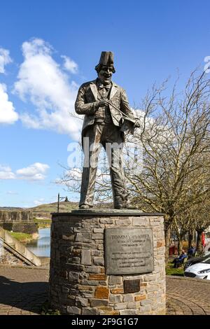 Caerphilly, Wales - April 2021: Statue in memory of the famous British comedian Tommy Cooper who was from the town. Stock Photo