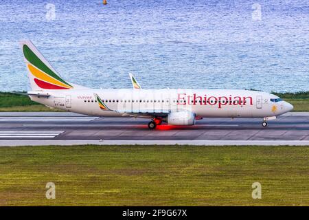 Mahe, Seychelles - November 23, 2017: Ethiopian Boeing 737-800 airplane at Seychelles International Airport (SEZ) in the Seychelles. Boeing is an Amer Stock Photo