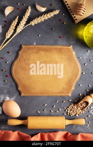 Bakery ingredients for homemade bread baking on table. Food recipe top view at stone background texture with copy space. Flat lay top view Stock Photo