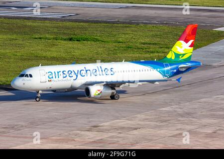 Mahe, Seychelles - November 25, 2017: Air Seychelles Airbus A320 airplane at Seychelles International Airport (SEZ) in the Seychelles. Airbus is a Eur Stock Photo