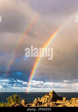 Rainbow over Oneloa Bay, Maui, Hawaii Stock Photo