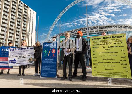 Wembley Park, London, UK. 18th April 2021.  Piers Corbyn, London Mayor candidate, protesting outside Wembley Stadium.  The 'Let London Live' candisate for the London Assembly elections and brother of former Labour leader Jeremy Corbyn is an 'anti vaxxer' who opposes the Vaccine Passport and ‘madness’ of lockdown.  Amanda Rose/Alamy Live News Stock Photo