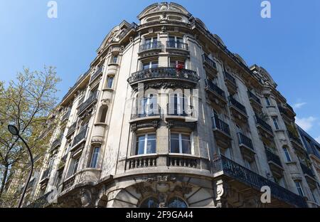 Traditional French house with typical balconies and windows. Paris, France. Stock Photo