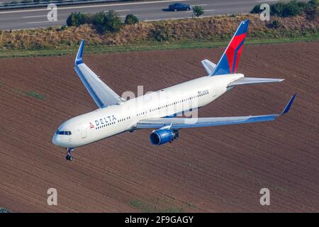 Stuttgart, Germany - September 2, 2016: Aerial photo of a Delta Air Lines Boeing 767 airplane at Stuttgart airport (STR) in Germany. Stock Photo