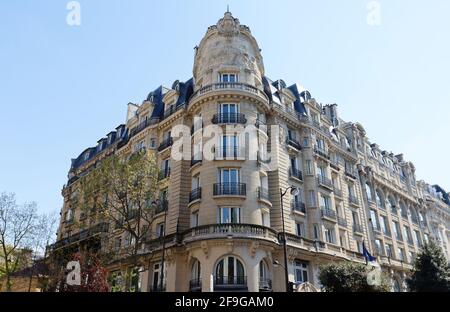 Traditional French house with typical balconies and windows. Paris, France. Stock Photo