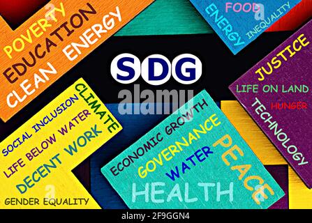 Photo on SDG (Sustainable Development Goals) theme. The acronym  "SDG" on a colorful background. Sustainable development concept image Stock Photo