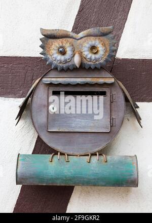 Mailbox and newspaper roll, owl figure, Thuringia, Germany Stock Photo