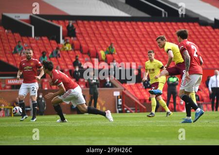 Manchester, UK. 18th Apr, 2021. Burnley's Chris Wood has a shot on goal during the Premier League match at Old Trafford, Manchester, UK. Picture date: Sunday April 18, 2021. Photo credit should read Credit: Anthony Devlin/Alamy Live News Stock Photo