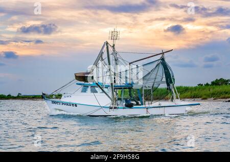 “Empty Pockets” shrimp boat heads out on a shrimping trip, July 7, 2012, in Bayou La Batre, Alabama. Stock Photo