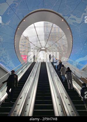 Looking east up the escalators at the new entrance off 7th Avenue to Penn Station and connection to the Moynihan Train Hall. New York City. Stock Photo