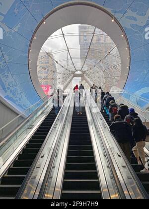 Looking east up the escalators at the new entrance off 7th Avenue to Penn Station and connection to the Moynihan Train Hall. New York City. Stock Photo