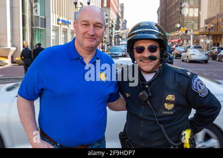 Indianapolis PD Motor Sergeant Jerald 'Jerry' Mahshie poses with retired Huntington PD and Purdue Fort Wayne PD Officer Trent Ruble in downtown Indy. Stock Photo