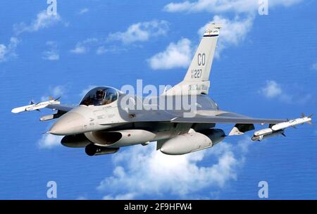 Recife, Brazil, November 10, 2010. United States Air Force Lockheed Martin F-16 fighter in flight off the coast of Brazil. Stock Photo
