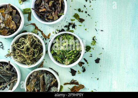 Sea vegetables with copy space. Various edible algae, shot from above Stock Photo