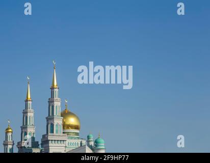 Islamic mosque on a blue sky background. The main cathedral mosque of Muslims in Moscow Russia. Islam, ramadan concept. High quality photo Stock Photo