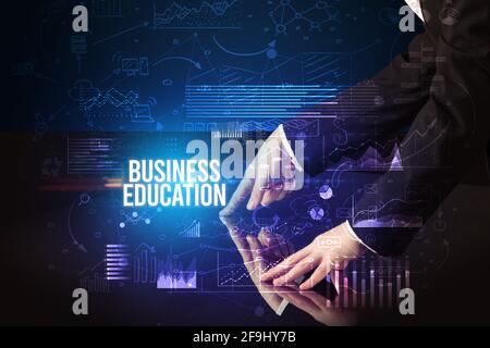Businessman touching huge screen concept Stock Photo
