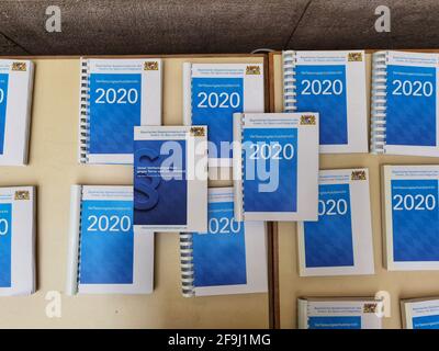 Munich, Bavaria, Germany. 19th Apr, 2021. Copies of the 2020 Verfassungsschutzbericht Bayern (2020 Bavarian Office for the Protection of the Constitution report). The Bavarian Verfassungsschutz (Secret Service, Office for the Protection of the Constitution) released the 2020 report detailing threats to the state of Bavaria and the country. Over the past year, conspiracy theorists, new age and wellness extremists, right-extremists, and various enemies of democracy have taken a leading role against the German state and society, with imagery such as the August 2020 storming of the Reichstag an Stock Photo