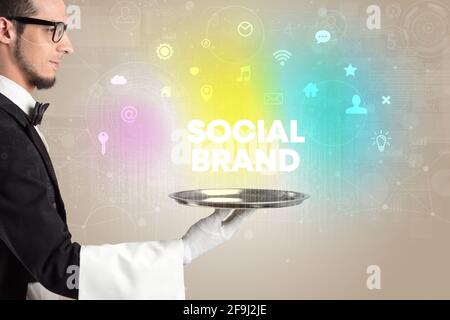 Waiter serving social networking concept Stock Photo
