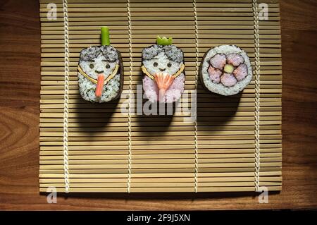 Making Rolled Sushi In A Bamboo Sushi Mat Stock Photo, Picture and Royalty  Free Image. Image 159721542.